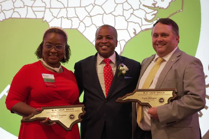 Wake County Commissioner Shinica Thomas (left), NCACC President and Warren County Commissioner Tare “T” Davis (center), and Brunswick County Commissioner Frank Williams (right) receiving the NCACC 2024 M.H. “Jack” Brock Outstanding County Commissioner Award during Annual Conference.
