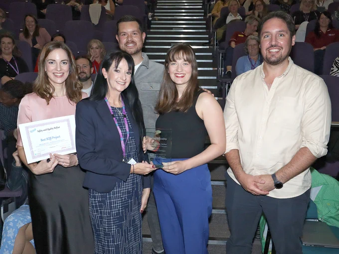 Group of staff with their SQB Award
