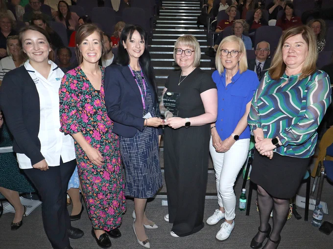 Group of staff with their Award at the SQB celebration event. 