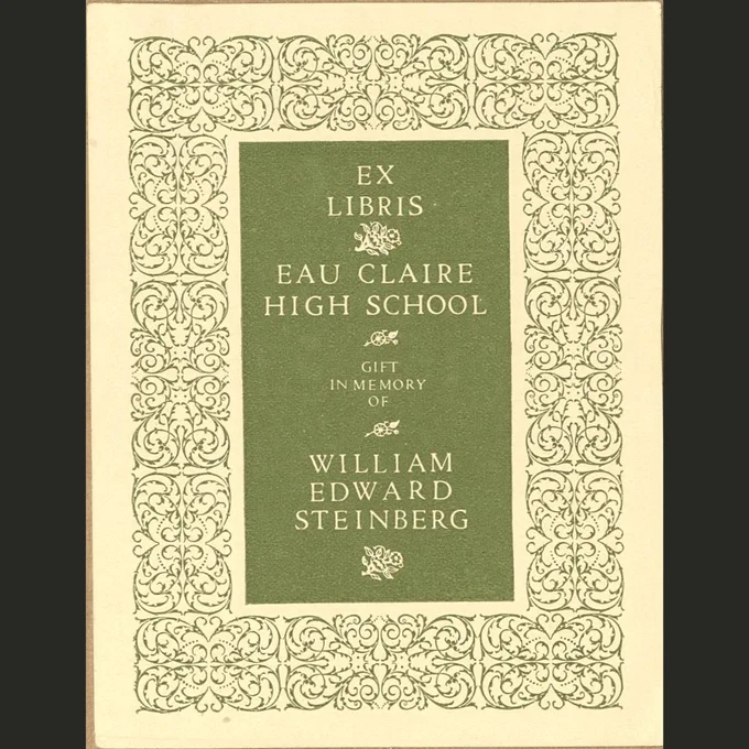  The bookplate from Eau Claire High School, also created by Gardner Teall, is in a light olive green and has a thick and ornate filigree design for a border. 