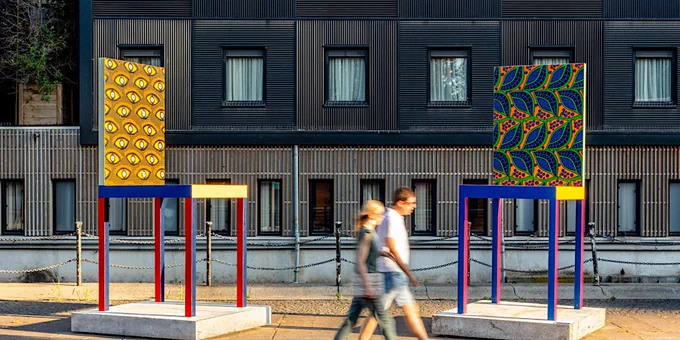 Colourful patterned large chair sculptures. 