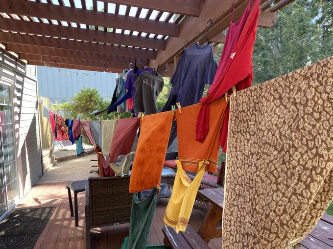 Clothes and towels line drying in the sunshine