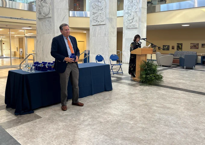 Dr. Marc Haut is recognized during the ceremony.