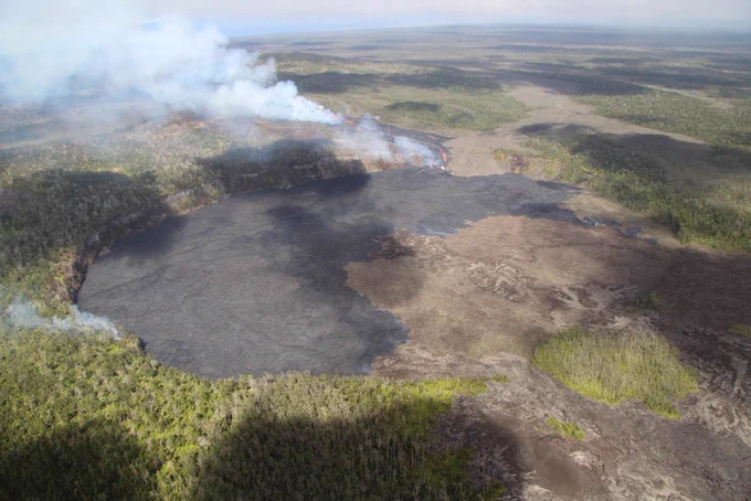 USGS Hawaiian Volcano Observatory geologists conducted a reconnaissance overflight of the eruption near Nāpau Crater on the middle East Rift Zone of Kīlauea. New lava from fissure eruptions over the past several days now covers about two thirds of the crater floor. USGS photo taken Sep 19, 2024, by M. Zoeller.