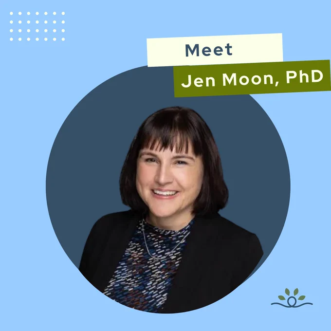 A headshot of a woman with straight dark hair cut into a bob shape with bangs, smiling. She is wearing a patterned top with a black blazer, set against a blue circle with light blue foreground. In the top left 4x7 dots in a rectangle shape are also shown. In the Top right it reads "Meet Jen Moon, PhD". At the bottom right there is the National Disability Center Graphic logo that features a blue line with a singular loop. Above that loop is 4 green leaves.