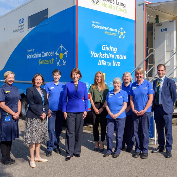 Chancellor Rachel Reeves standing with researchers and representatives from Yorkshire Cancer Research outside the Leeds Lung Health Check.
