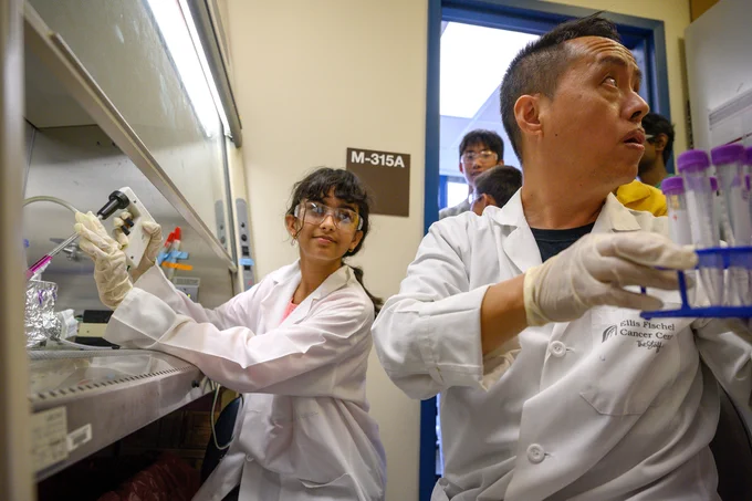 Left, Smithton Middle School student Aarushi Singh, 12, attended a hands-on “mini-medical school” camp at Mizzou developed by MU researcher and clinician Yujiang Fang, right. Photo by Marshall Danner, MU Extension.