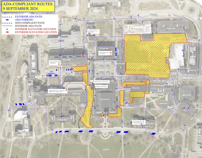 An aerial map featuring Williams Hall, Pamplin Hall, Derring Hall, Cowgill Hall, Burruss Hall, Johnston Student Center, Norris Hall, and Patton Hall. A large space in between Burruss Hall and Pamplin Hall is in yellow and red to denote the impacts. Accessible routes are featured using blue lines and arrows to navigate around impacts. A yellow box reads "ADA-Compliant routes 9 September 2024."