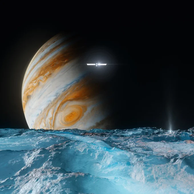 An illustration of the Europa Clipper spacecraft passing over the surface of Jupiter's moon Europa. The spacecraft appears small at a distance, with sunlight glinting off its solar panel wings. Europa's surface has rough, blue ice, with a geyser spout. Jupiter rises over the horizon in the background.