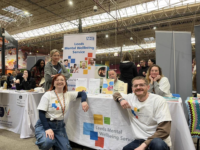 Colleagues from Leeds Mental Wellbeing Service in  a photo at our stall.