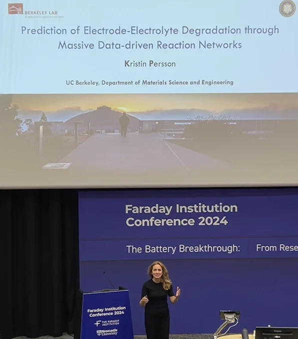 A picture of Professor Kristin Persson presenting at the Faraday2024 conference "Prediction of Electrode-Electrolyte Degradation through Data-driven Massive Reaction Networks".