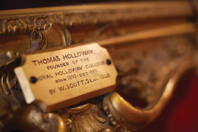 Plaque on frame 'Thomas Holloway Founder of the Royal Holloway College, Born 1800 Died 1883, By W.Scott.Sent.1845' Picture by Luke Davis
