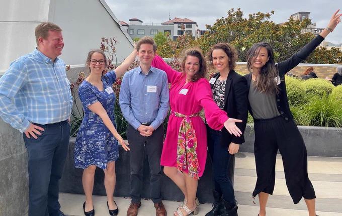 Six Chicago-Kent IP Law faculty striking a fun pose outside of IPSC under the California sun.