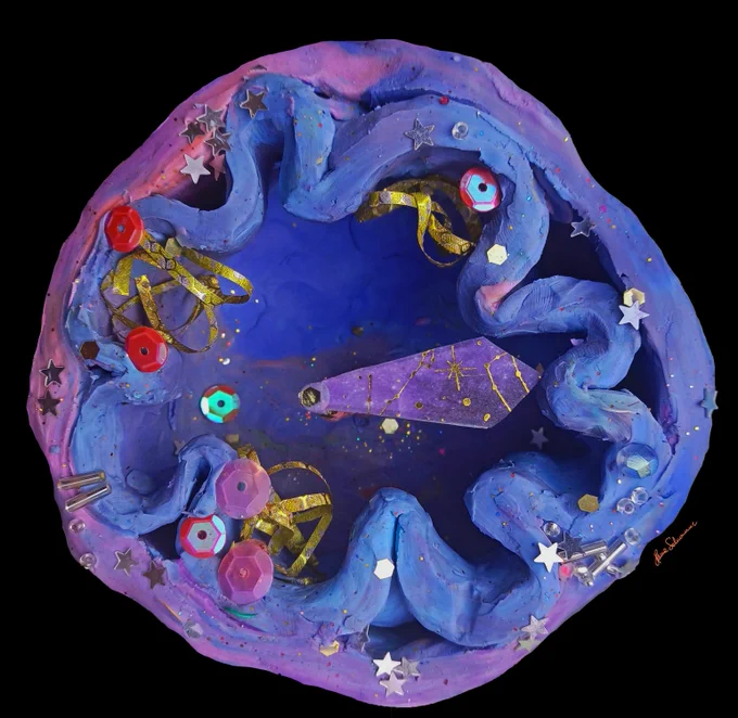 Mitoclock made out of plasticine, representing mitochondrial plasticity and stability across time. 