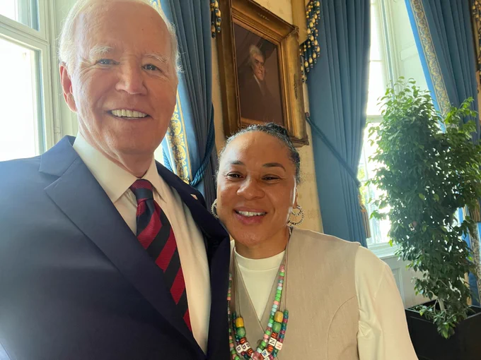 President Biden and Coach Staley take a selfie.