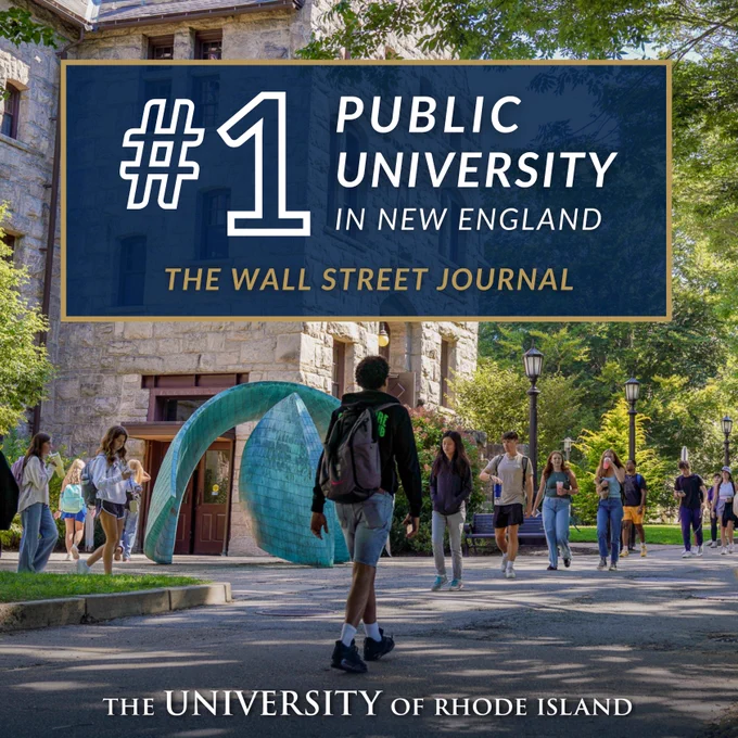 Students walk between Lippitt Hall and the Quad on campus. Overlaid text announces URI’s ranking as the #1 public university in New England by the Wall Street Journal's 2025 Best Colleges in the U.S. rankings. The students are captured in casual conversation and heading to class. Dappled sunlight hits a curved bronze sculpture and the historic stone façade of Lippitt Hall.