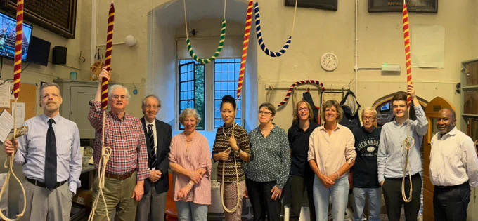 A group of 12 bell ringers