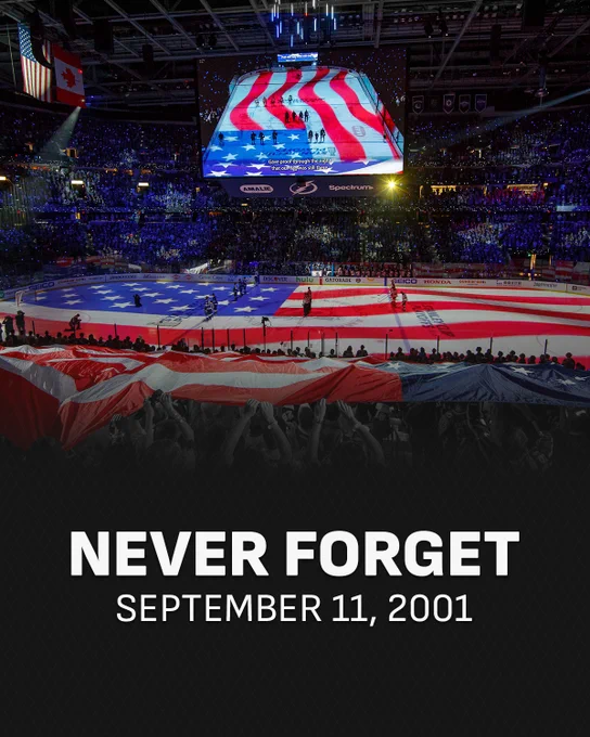 Top: Photo of the American flag being projected onto the ice and jumbotron at a hockey game. 

Bottom: White text on a black background that reads, "Never forget September 11, 2001".