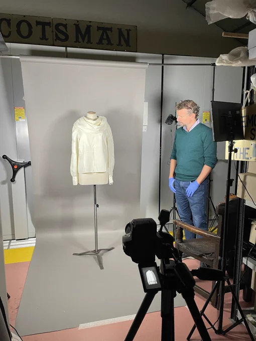 Photography being set up of a blouse on a mannequin