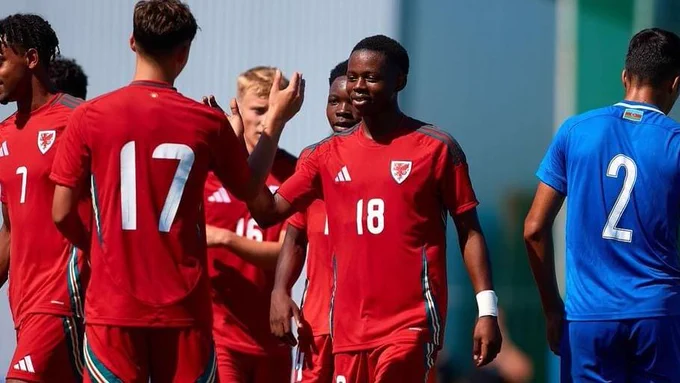 Menzi Mazwi celebrates scoring for Wales Under-19s against Azerbaijan.
