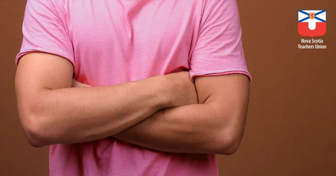 Person wearing a pink shirt.
