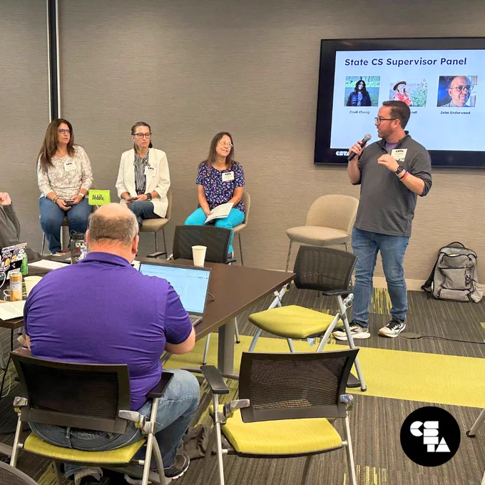 CSTA's K through 12 Standards Project Manager, Jake Koressel, stands at the front of the room to introduce a panel of state CS supervisors.