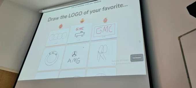 Projector screen with students' drawings 