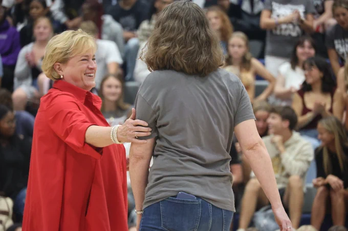 Karla Eslinger hugging Jessica Jones