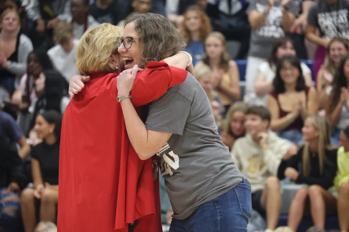Karla Eslinger hugging Jessica Jones