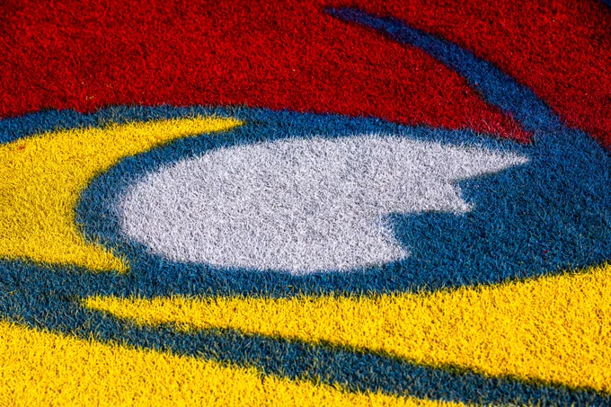 Close-up of a colorful, textured surface of the Jayhawks logo of the University of Kansas.