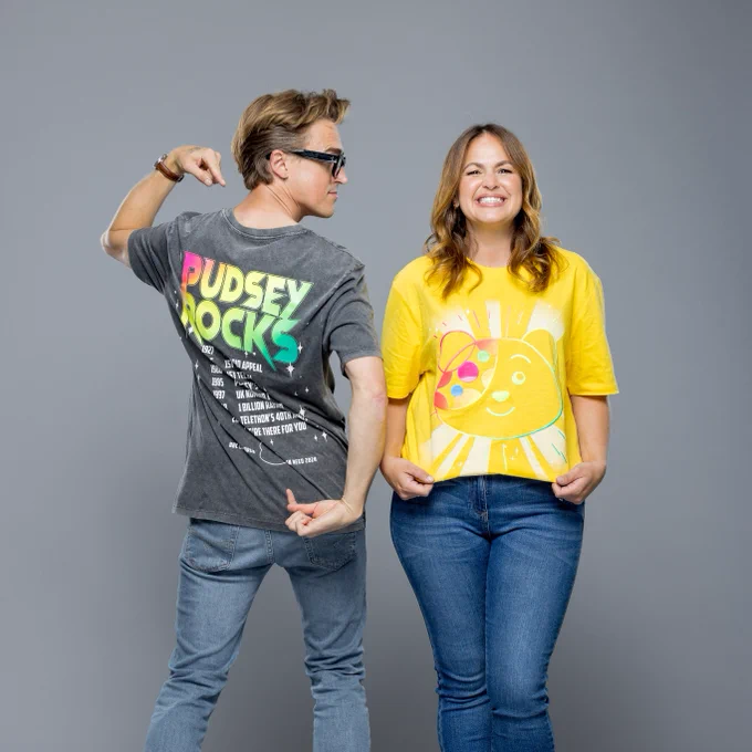 Tom and Giovanna Fletcher wearing the Official 2024 BBC Children in Need t-shirt