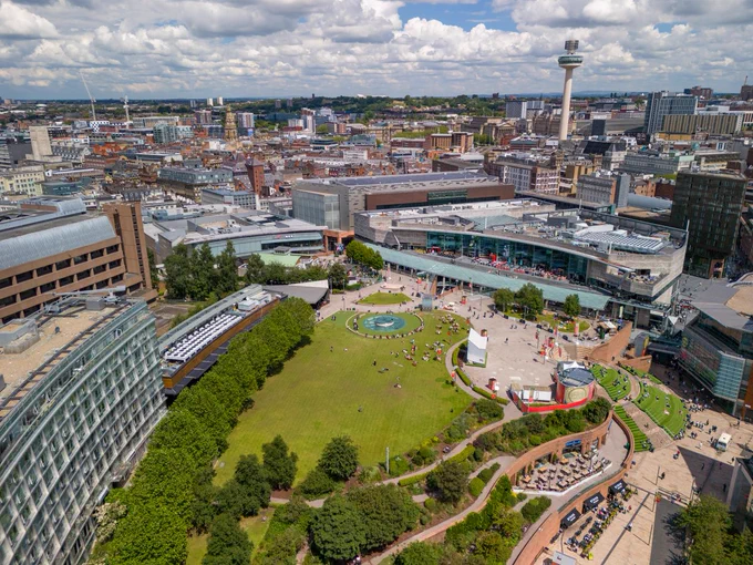 aerial view of Liverpool ONE retail outlets with green outdoor space