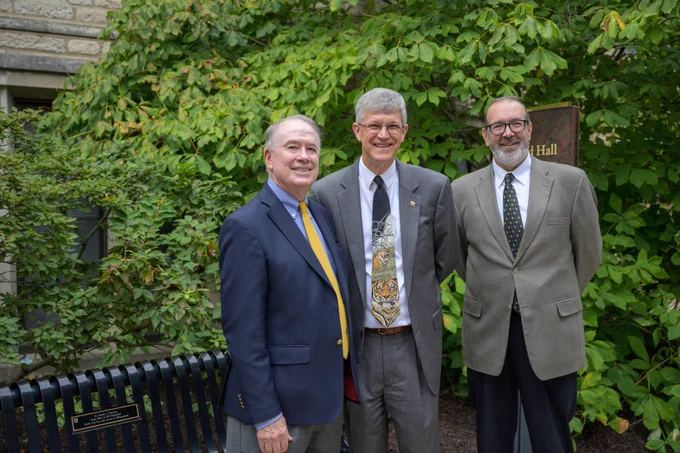 L to R: Brady J. Deaton, Jim Spain, vice provost for undergraduate studies and Chad Higgins, vice chancellor for extension and engagement, post in front of the newly dedicate bench honoring Deaton. 