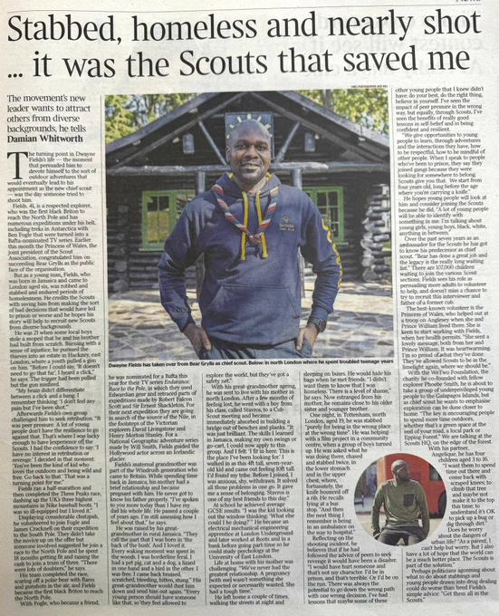Newspaper clipping of an article about Chief Scout Dwayne Fields. Two photos of him, one large phot of him wearing his hoodie with words ‘Chief Scout’ printed. He is also wearing a Scout’s necker. The other smaller photo pictures Dwayne in an outdoor setting.