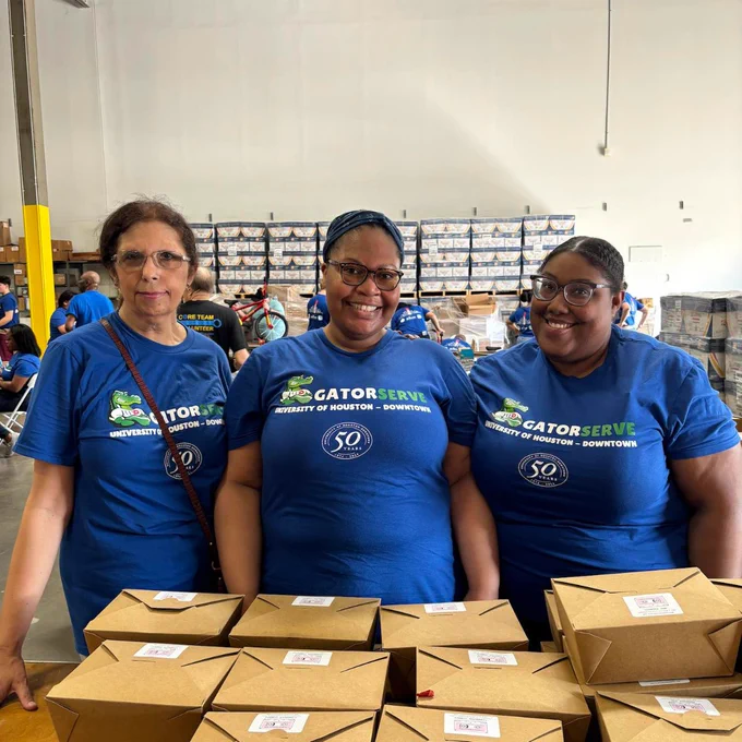 UHD staff members at GatorServe and Cycle Houston's bike build day.