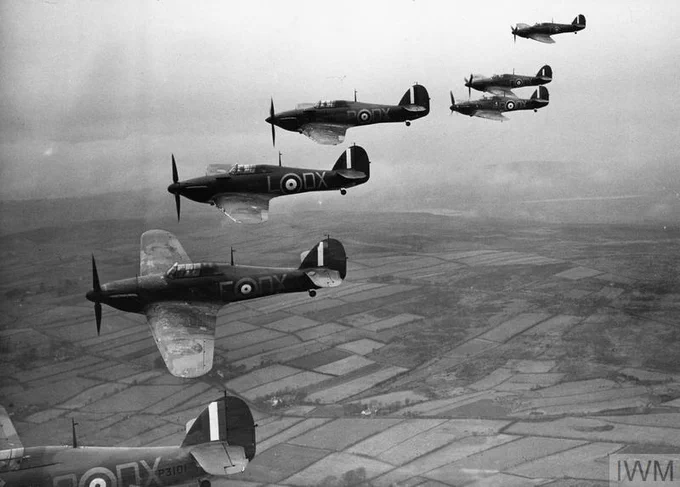 Image shows a black and white photo of a squadron of Hurricanes from the Battle of Britain.