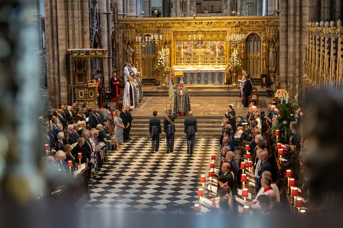 View of the service taking place at Westminster Abbey, with the congregation visible and the altar in the background.