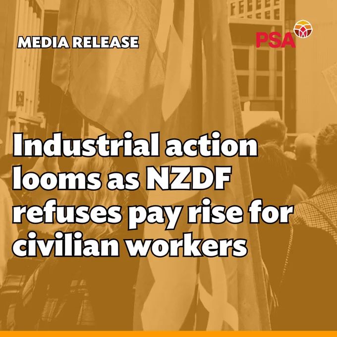 The image is a black and white photo tinted with an orange hue, of the backs of people with flags and placards. “MEDIA RELEASE” is in the top left-hand corner in white. Beneath is the headline “Industrial action looms as NZDF refuses pay rise for civilian workers” in large white text. A red PSA logo is in the top right.