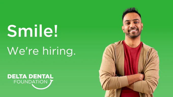 Tan man with arms folding, smiling and standing next to text that reads, "Smile! We're hiring." The Delta Dental Foundation logo is in the bottom left. Background is green.  