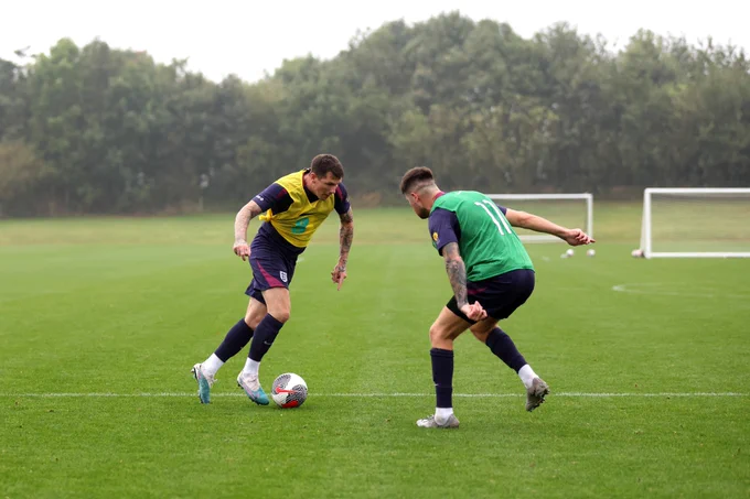 Matt Crossen goes up against Harry Baker during an England Cerebral Palsy training session