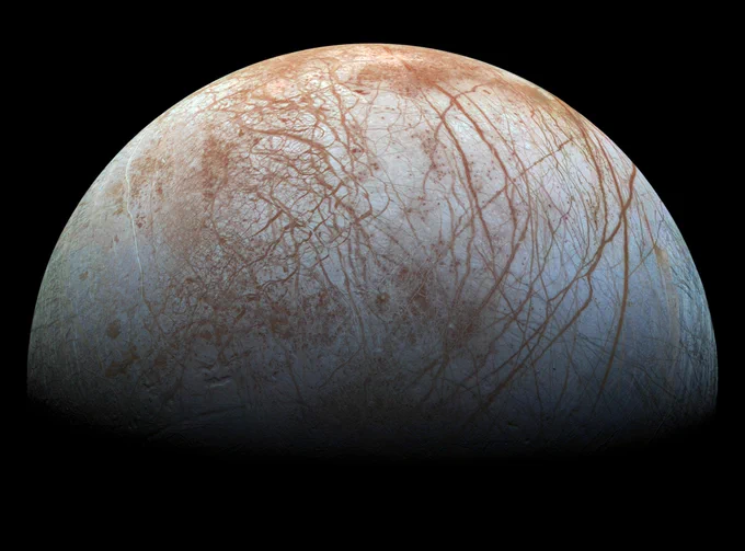 The puzzling, fascinating surface of Jupiter's icy moon Europa looms large in this newly-reprocessed color view, made from images taken by NASA's Galileo spacecraft in the late 1990s. This is the color view of Europa from Galileo that shows the largest portion of the moon's surface at the highest resolution. Credit: NASA/JPL-Caltech/SETI Institute