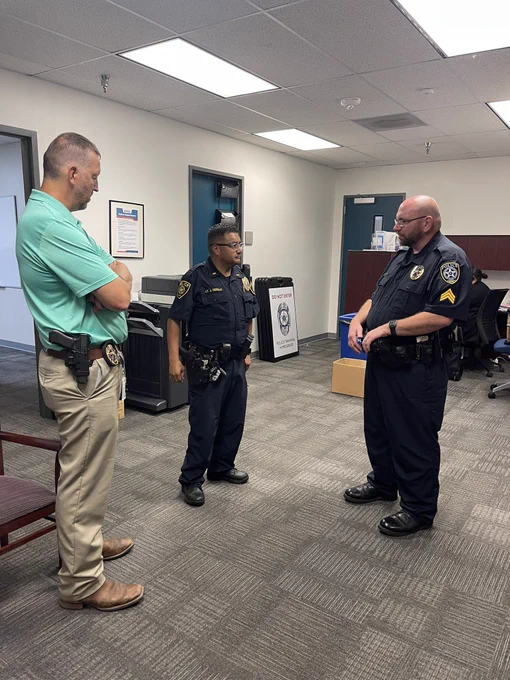 DISD Lt. Cedillo engaging with Dallas College Sgt. Shaw and Sgt. Cunningham.