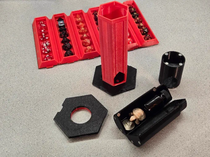 Photo of a fully open Rollup Dice Box with Tower Core, including a remixed bonus compartment holding a coin, a small bottle, and a turtle figurine.