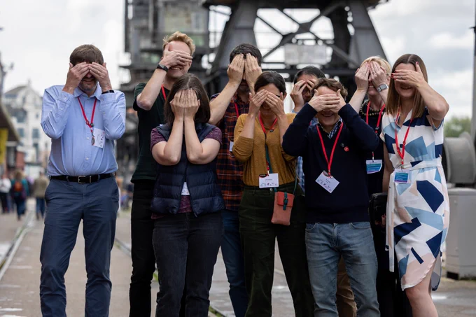photo of people covering their faces