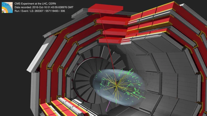 CMS candidate collision event for a W boson decaying into a muon (red line) and a neutrino that escapes detection (pink arrow). (Image: CMS/CERN) / Événement de collision candidat de CMS pour un boson W se désintégrant en un muon (ligne rouge) et un neutrino qui échappe à la détection (flèche rose). (Image: CMS/CERN)