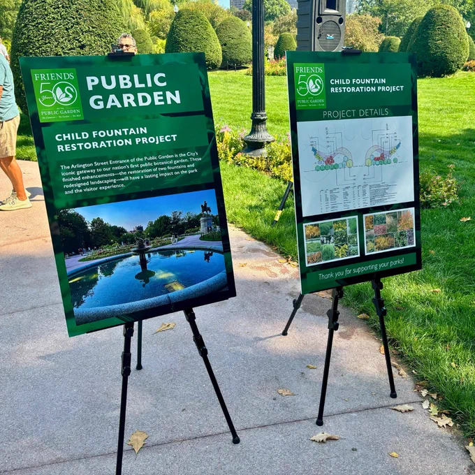 Informational posters about the Child Fountain Restoration Project on display at the Public Garden 