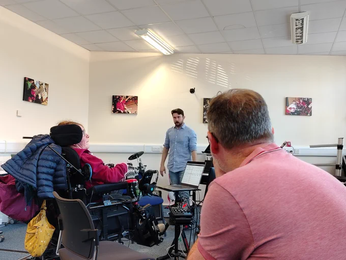 Stuart watches on as Colin and Rhona perform his piece 