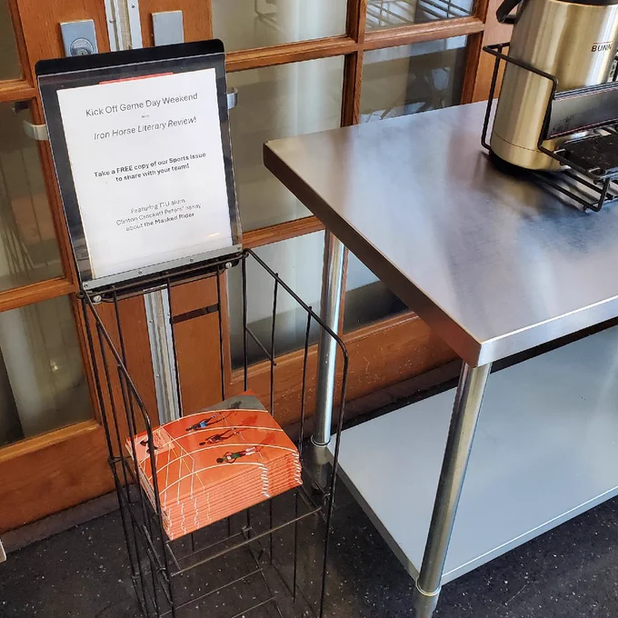 The kiosk containing free copies of the Sports Issue from Iron Horse Literary Review.