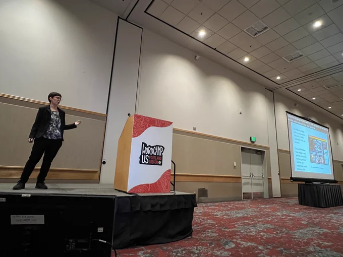 Linnea Huxford on stage at WordCamp US Showcase Day