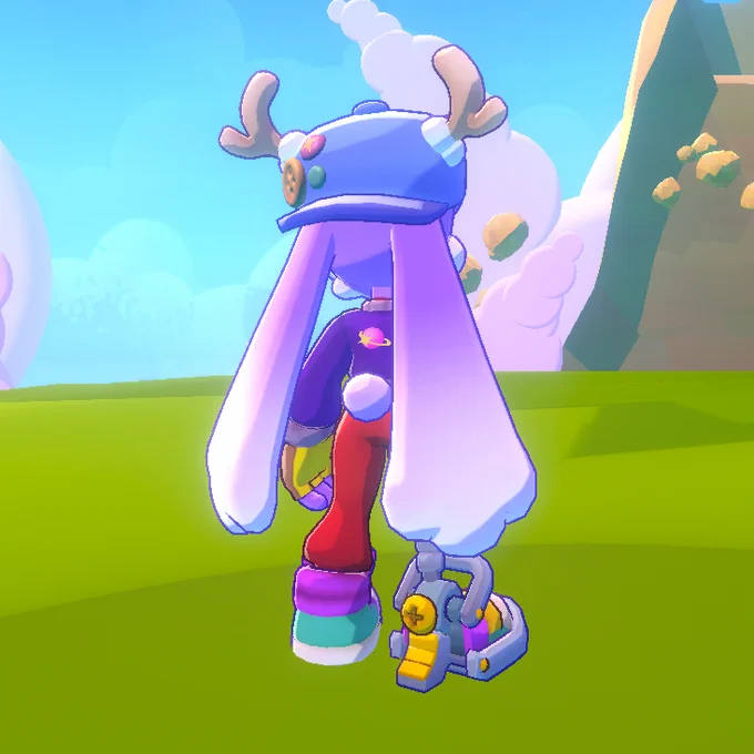 Rear view of Olive. Several badges and buttons can be seen on her cap, along with a small logo of a pink planet circled by a yellow star on her jacket. She also has a small, round tail.